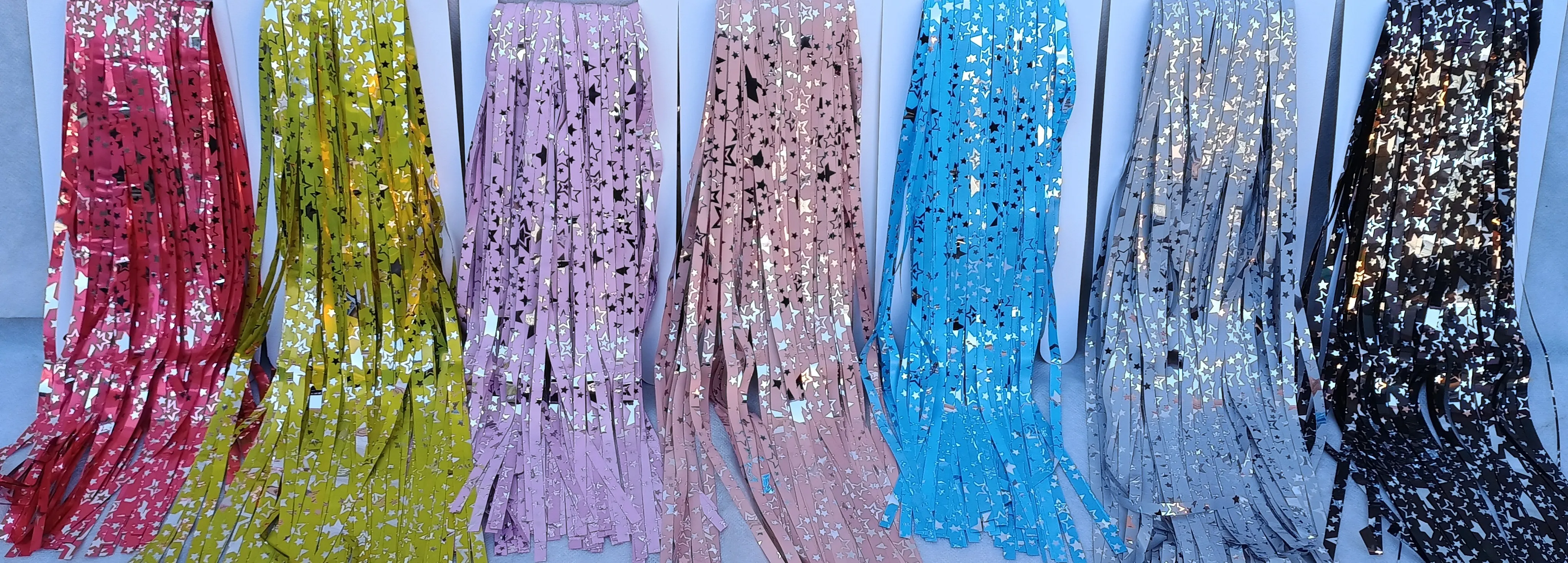 CORTINA METALIZADA COM ESTRELAS